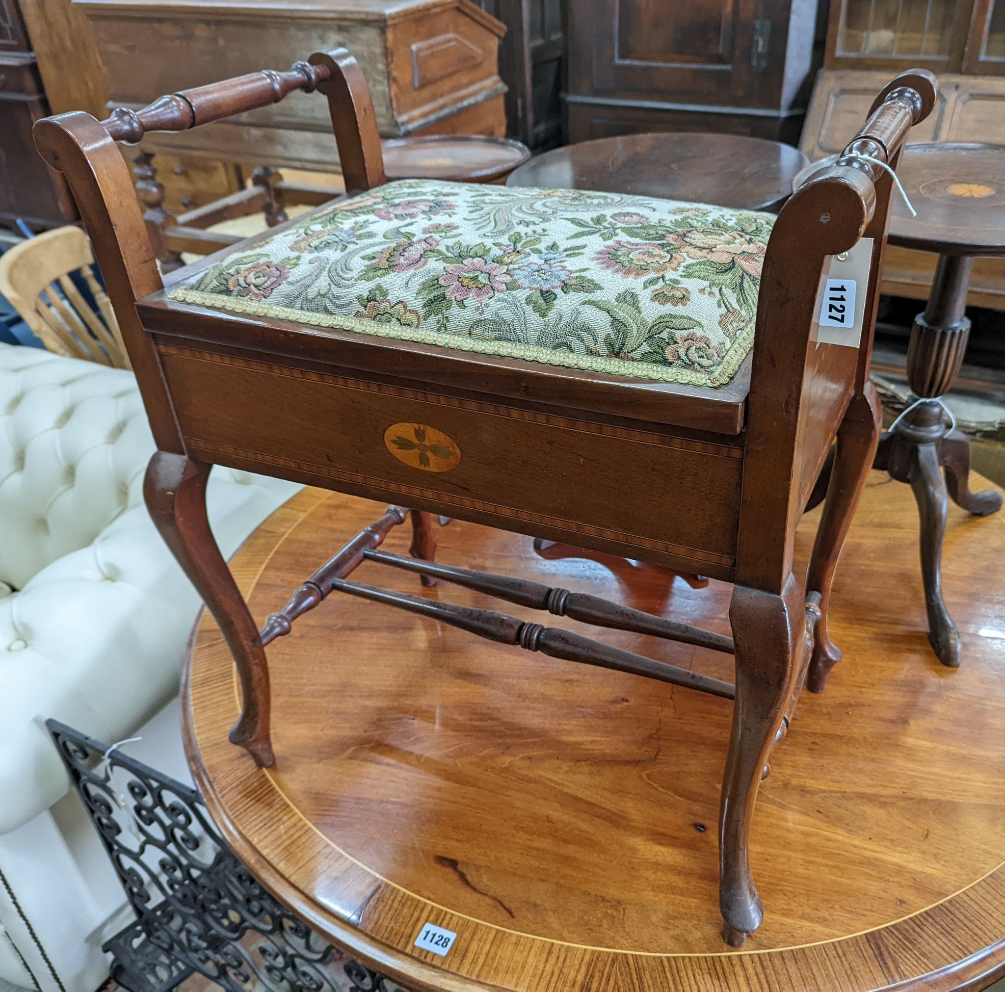 An Edwardian inlaid mahogany piano stool